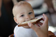 Photo: Toddler eating toast Toddler eating toast