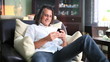 handsome man writing text message on cell phone