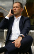 Man in his 30s talking on the phone