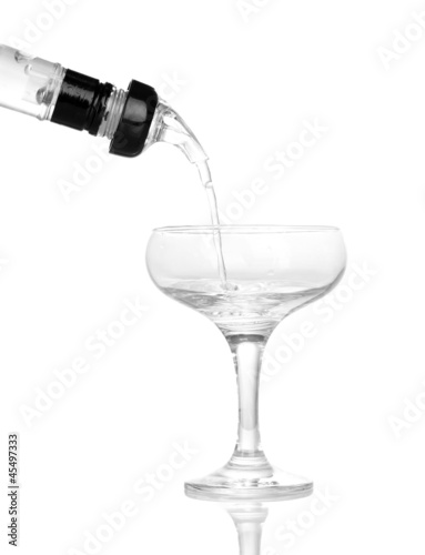 Photo: Tasty transparent cocktail isolated on white Tasty transparent cocktail isolated on white