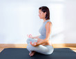 Beautiful pregnant woman at gym fitness yoga