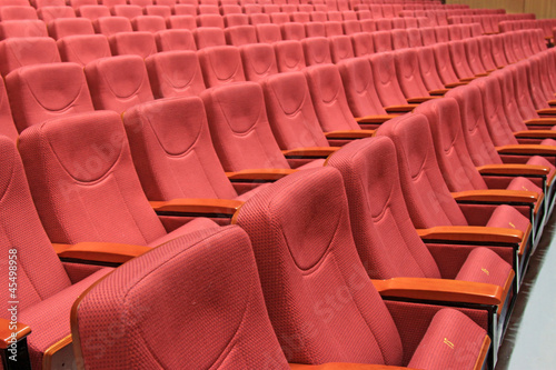 Photo: rows of chairs in a theater rows of chairs in a theater