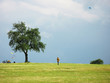 Flying a kite in stormy sky