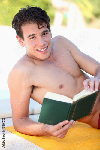 Photo: Boy reading book Boy reading book