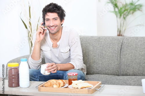 Photo: portrait of a man at breakfast portrait of a man at breakfast