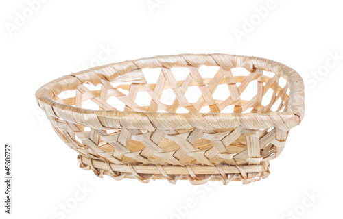 Photo: Wickerwork empty yellow breadbasket on white background Wickerwork empty yellow breadbasket on white background