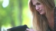 Young woman working in park - 2