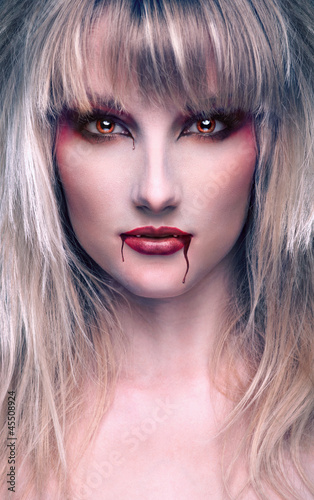 Photo: portrait of a beautiful blond girl vaprire portrait of a beautiful blond girl vaprire