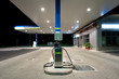 Gas station at night.