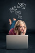 Illustration: Cute girl working on a laptop against black background Cute girl working on a laptop against black background