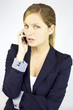 Beautiful blond business woman talking on the phone