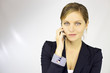 Gorgeous business woman talking on the phone happy