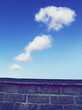 clouds over wall