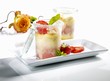 Cheese cake with strawberries in jars