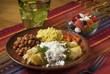 Rolled Veggie Stuffed Tortillas with Green Salsa (Enchiladas de Calabacita en Salsa Verde)