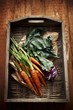 Foto: Carrots and kohlrabi on a wicker tray Carrots and kohlrabi on a wicker tray