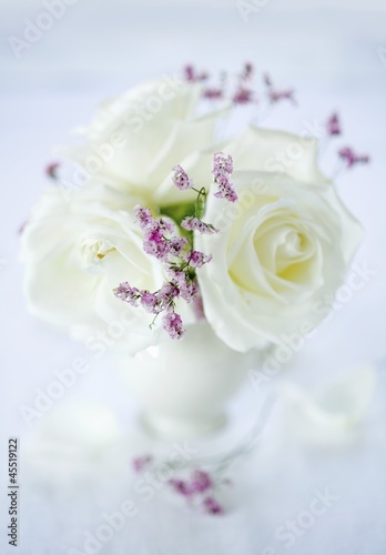 Photo: White roses in a vase White roses in a vase
