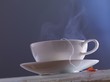A streaming cup of tea with a tea bag