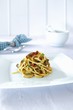 Spaghetti with dried tomatoes, herbs and olives