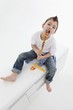 A little boy eating a giant lolly