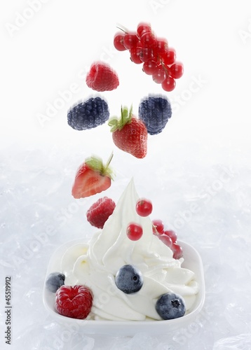 Photo: Yogurt ice cream garnished with fresh berries Yogurt ice cream garnished with fresh berries
