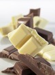 Pieces of white and dark chocolate