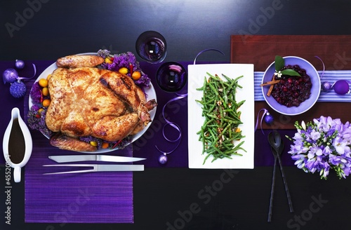 Photo: Chinese roasted turkey with green beans on a table with purple decorations Chinese roasted turkey with green beans on a table with purple decorations