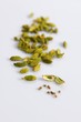 Cardamom pods, one opened