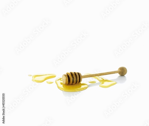 Photo: Honey with honey dipper Honey with honey dipper
