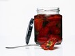 A jar of dried tomatoes in oil