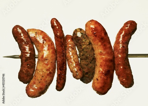 Photo: Various grilled sausages on a skewer Various grilled sausages on a skewer