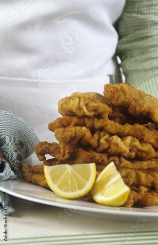 Photo: Several Wiener Schnitzel (breaded veal escalopes) on plate Several Wiener Schnitzel (breaded veal escalopes) on plate