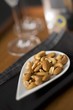 Various nuts in a white dish