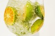 Citrus fruits in a glass of water