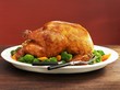 Roasted stuffed turkey with vegetables
