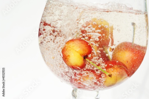Photo: Sweet cherries in a glass of water Sweet cherries in a glass of water