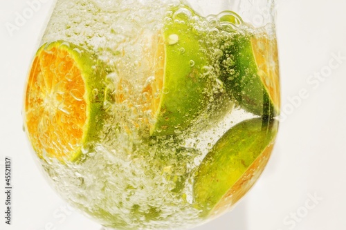 Photo: Citrus fruits in a glass of water Citrus fruits in a glass of water