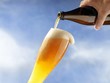 A wheat beer being poured