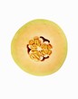 Half of a Cantaloupe Melon with Seeds; White Background