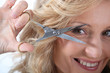 Hairdresser with a pair of scissors