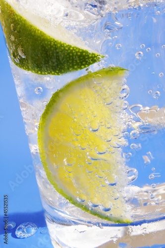 Photo: A drink with soda water, lemon and ice A drink with soda water, lemon and ice