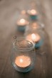 Windlights on wooden table