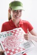 Smiling woman with pizza box, giving thumbs up sign