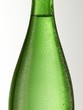 Green glass bottle with condensation (detail)