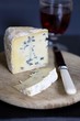 A piece of blue cheese (type: Mrs Temple's Binham Blue, Norfolk, UK)
