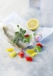 Steamed fillets of charr with mixed peppers