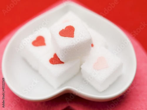 Photo: Sugar cubes with hearts Sugar cubes with hearts