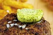 Herb butter melting on burger