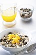Muesli with pumpkin seeds and oranges