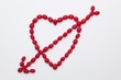 Tomatoes forming heart with arrow
